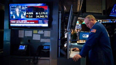 Συγκρατημένη αισιοδοξία στη Wall Street για πληθωρισμό και επιτόκια