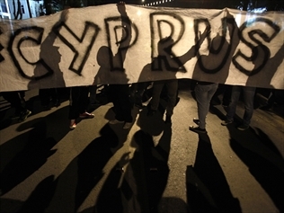 356421-imf-releases-first-cyprus-bailout-funds