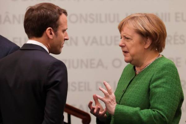The Times: Κόντρα Μέρκελ-Μακρόν για το κορυφαίο αξίωμα της Κομισιόν