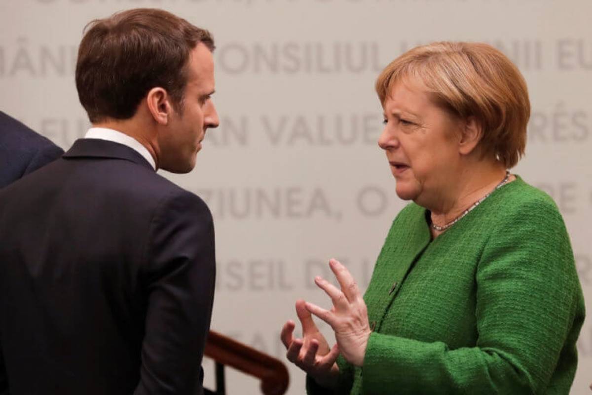 The Times: Κόντρα Μέρκελ-Μακρόν για το κορυφαίο αξίωμα της Κομισιόν