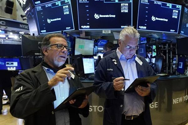 Ασταμάτητη η Wall Street-Νέα ρεκόρ για Dow Jones, S&P 500
