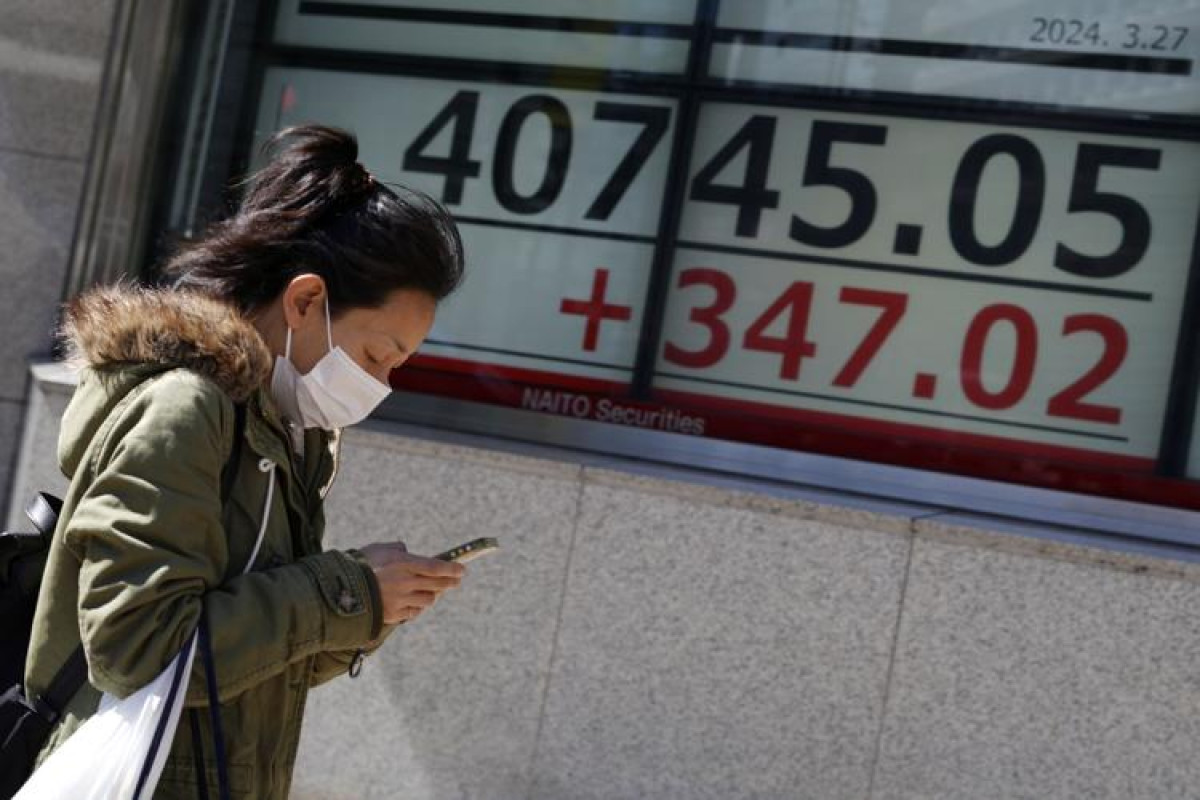 Ασιατικές αγορές: Ανοδικές τάσεις μετά τα ρεκόρ στη Wall Street
