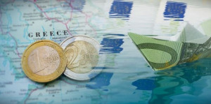Ενισχύονται τα ομόλογα εν αναμονή της Fitch