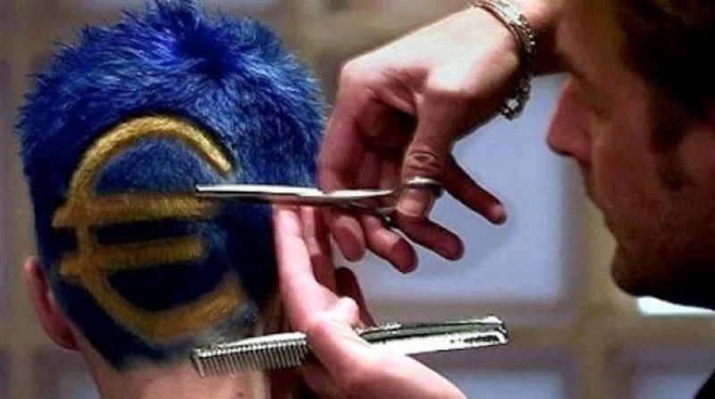 Όλι Ρέν: Υπέρμαχος της μείωσης των μισθών στην Ελλάδα και της νομιμότητας της τρόϊκας- Γιατί δεν έγινε haircut στο ελληνικό χρέος το 2010