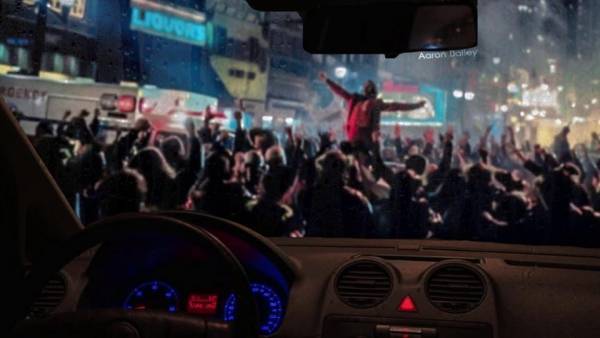 Πορτοκαλί παράσιτο και μαύρος Τζόκερ