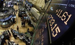 Επανέρχεται η αισιοδοξία στη Wall Street παρά το ρεκόρ κρουσμάτων