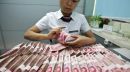Κίνα:«Ένεση» ρευστότητας 202 δισ. γουάν στην κεντρική τράπεζα τον Φεβρουάριο
