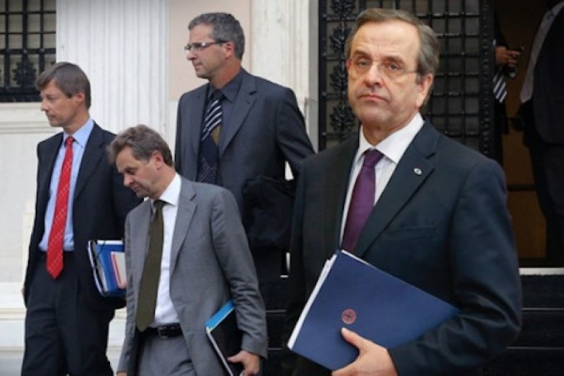 Αγώνας δρόμου με τους δανειστές σε βαρύ πολιτικό κλίμα